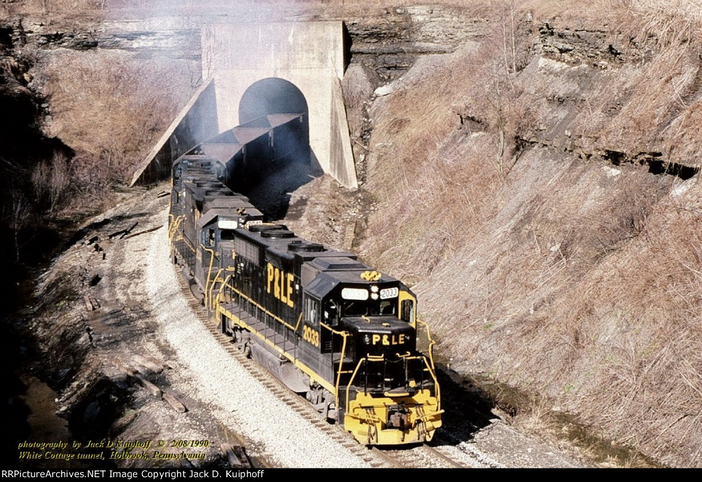 P&LE GP38s 2033-2041-2037 with southbound empties on the Monongahela Railway Waynesburg Southern, exiting White Cottage tunnel, White Cottage, Pennsylvania. February 8, 1990. 